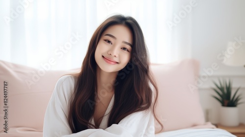 Young beautiful asian woman just woke up in the early morning 