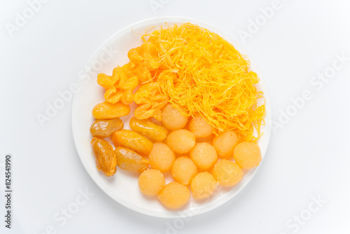 Thong Yip and Thong Yot traditional Thai desserts Presenting the bright colors and cultural essence of Thai desserts in a beautiful food photography environment.