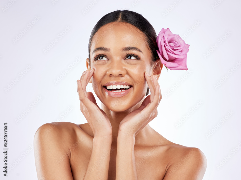 Flower, thinking and face of woman with skincare or natural dermatology on studio background. Floral, cosmetics and girl with self care for healthy glow on skin or rose blossom with beauty in spring