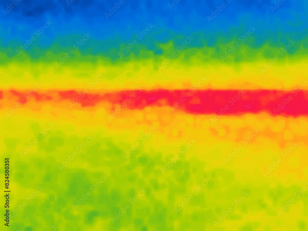 The edge of the forest. On the border of a field and a forest on a sunny summer day, hot weather. Image from thermal imager device.