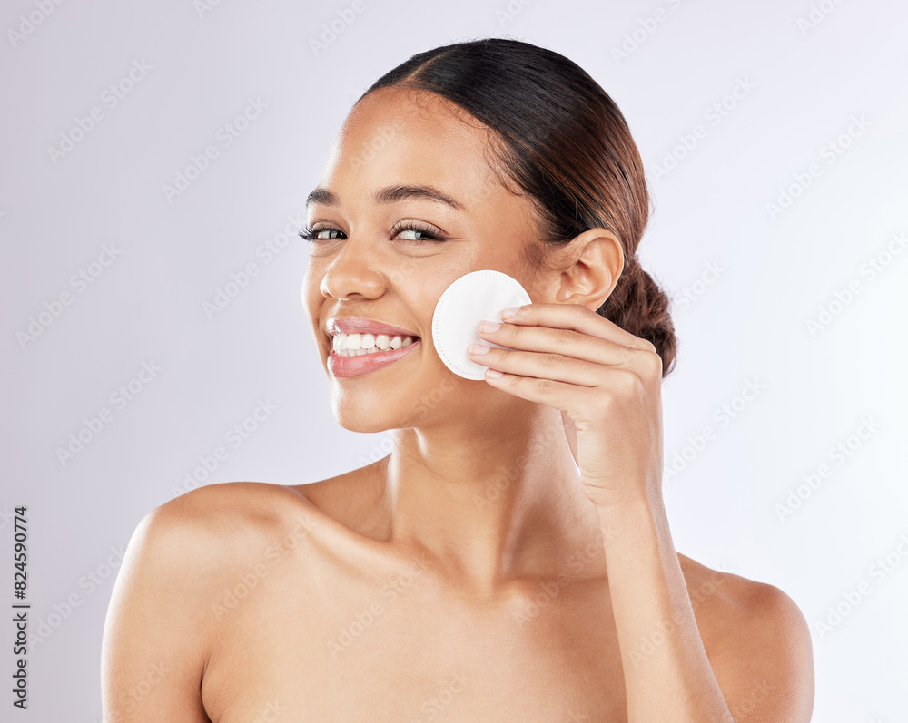Skincare, woman and portrait in studio with cotton pad for cosmetics, dermatology or makeup removal on white background. Spa, wellness and model for satisfaction, clear skin or wipe face on mockup Skincare, woman and portrait in studio with cotton pad for cosmetics, dermatology or makeup removal on white background. Spa, wellness and model for satisfaction, clear skin or wipe face on mockup