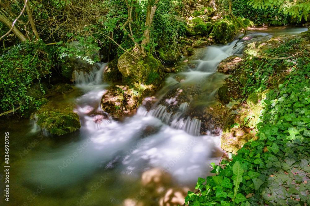 Veliki Buk in Lisine, Serbia. Cascade falls over mossy rocks Veliki Buk in Lisine, Serbia. Cascade falls over mossy rocks
