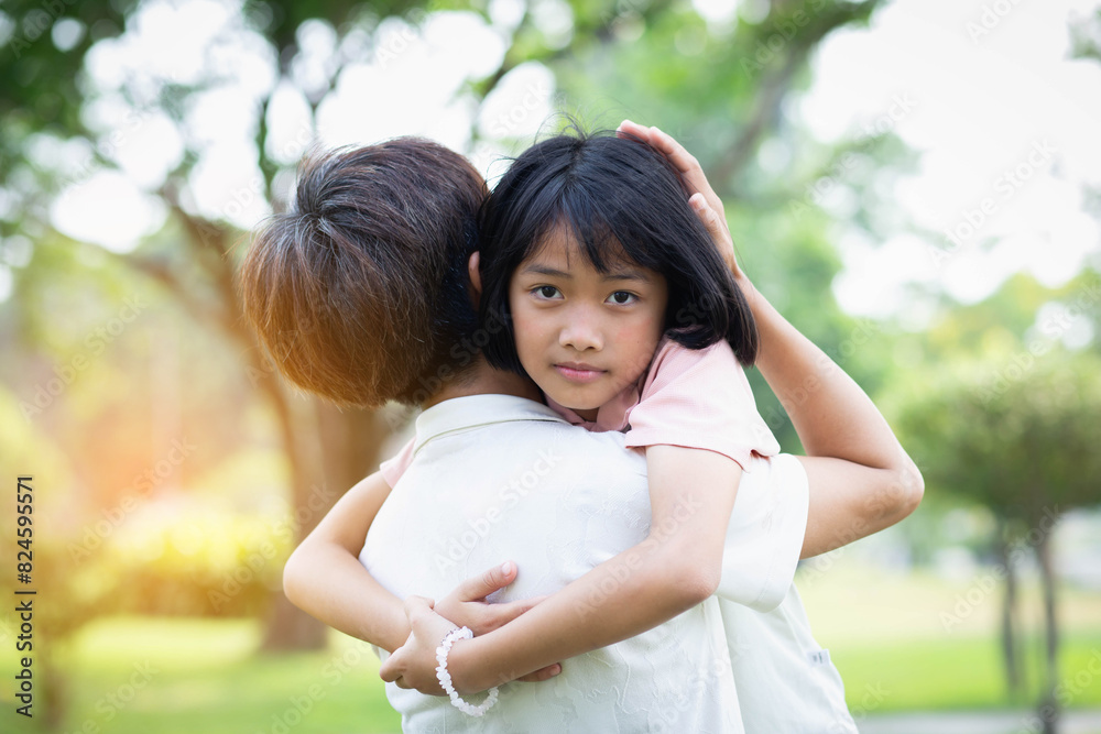 Daughter and mother hugging each other Daughter and mother hugging each other