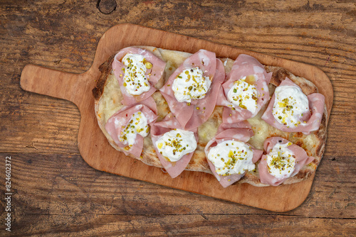 Pinsa romana mortadella burrata e pistacchi, pizza romana photo