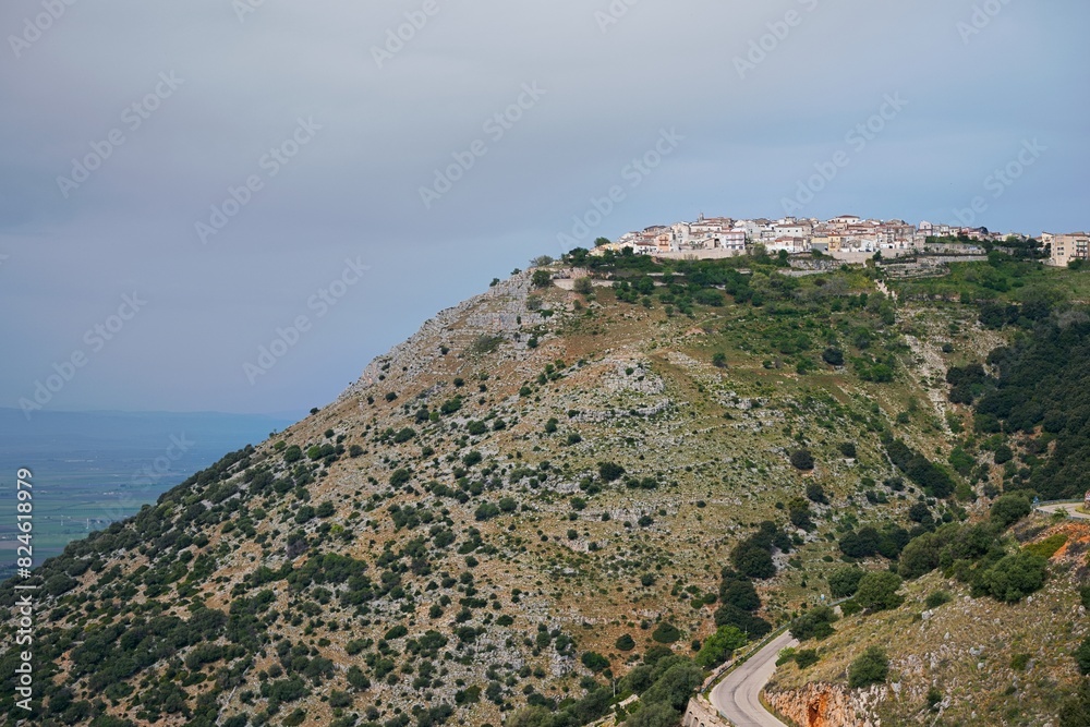 View of Rignano Garganico city on the top of the hill. Gargano, Italy, Europe. View of Rignano Garganico city on the top of the hill. Gargano, Italy, Europe.