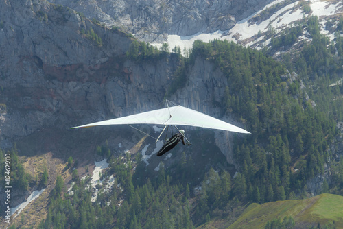 Hang gliding above mountain valley near Jenner mount Berchtesgaden National Park photo