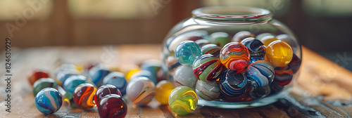 Accumulation in Focus: Colorful Marbles Filling a Glass Jar Suggest the Beauty of Consistent Efforts photo