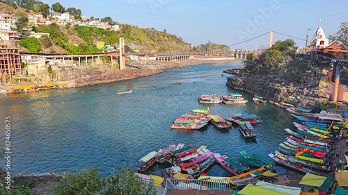 View of Narmada River With Boats, Omkareshwar, Madhya Pradesh, India. photo