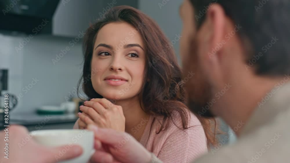 Flirting lady talking husband at kitchen interior closeup. Pair drinking coffee Flirting lady talking husband at kitchen interior closeup. Pair drinking coffee