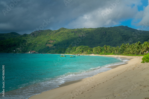 Golden Sunset Over Paradise Beach: Summer Serenity in Seychelles (ID: 824686390)