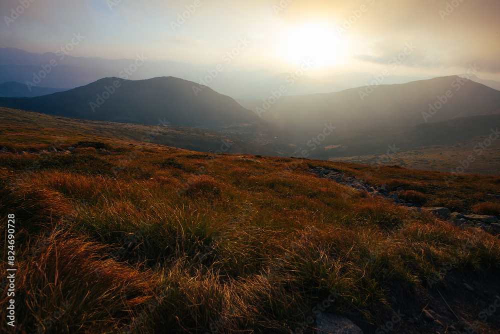 Fototapeta premium Amazing sunset in Ukrainian Carpathian mountains , Chornigysrsyi hrebet range