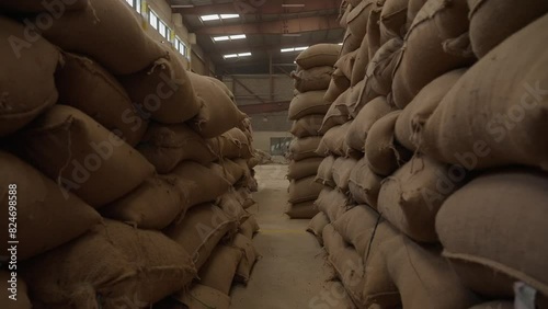 Bags of grain coffee in a warehouse in Ethiopia, slow motion