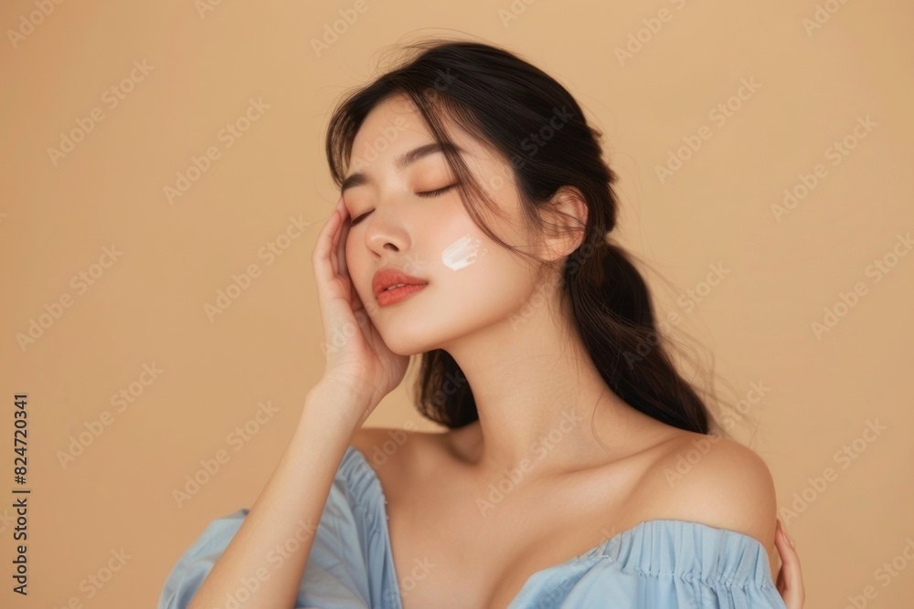 Young Asian woman touching her face with healthy skin. Young Asian woman touching her face with healthy skin.