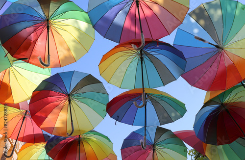 Colorful Umbrellas hanging between buildings in Midyat  Mardin  Turkey