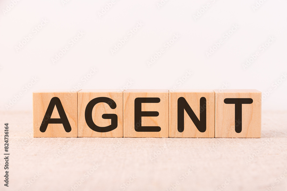 Fototapeta premium AGENT word made with building blocks on a light background