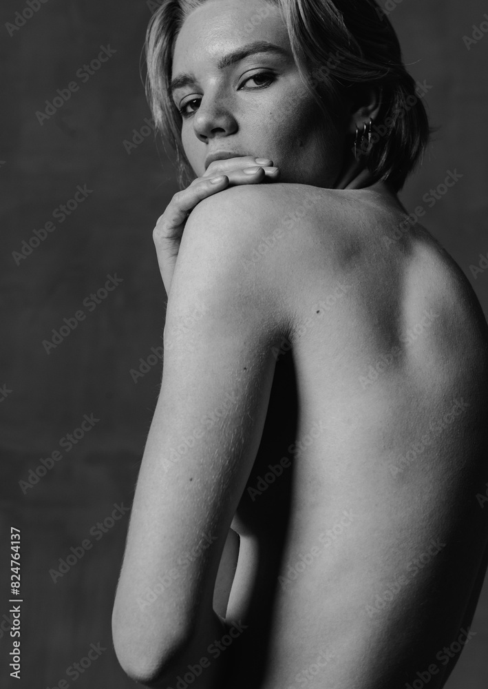 Fashionable and beautiful portraits of beautiful girl in jeans, short haircut and blonde hair Fashionable and beautiful portraits of beautiful girl in jeans, short haircut and blonde hair