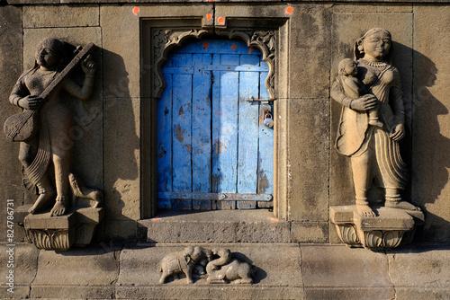 24 February 2024, Exterior View of the scenic tourist landmark Maheshwar fort (Ahilya Devi Fort ) in Madhaya pradesh, India, Beautiful sculptures Carving details on the outer wall. photo