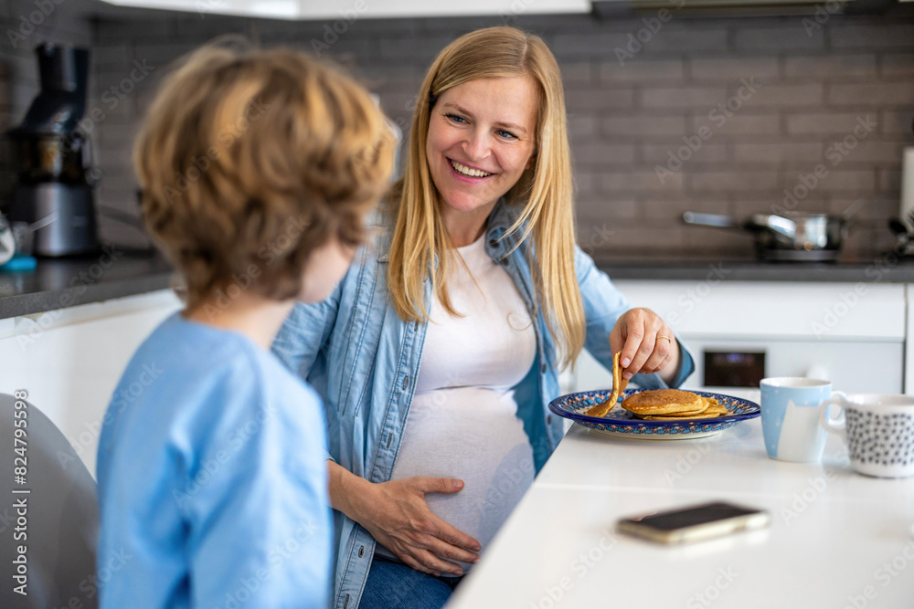 Little boy with his pregnant mother at home
Little boy with his pregnant mother at home