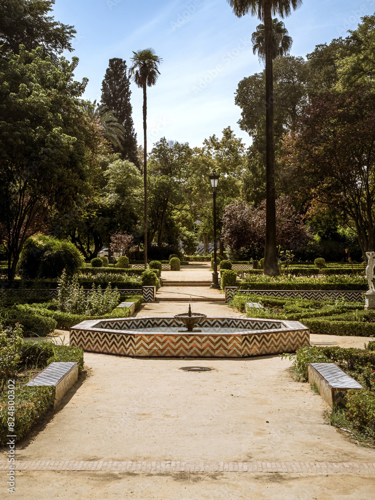 Fototapeta premium A tiled water fountain in the park named Parque Maria Luisa in Seville