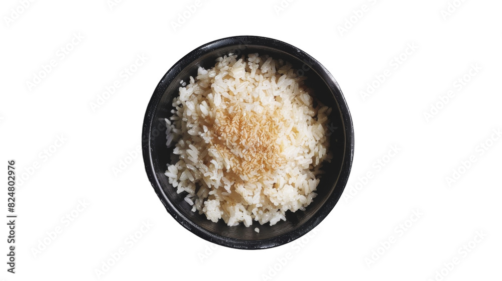 Black bowl filled with rice against a white background Black bowl filled with rice against a white background