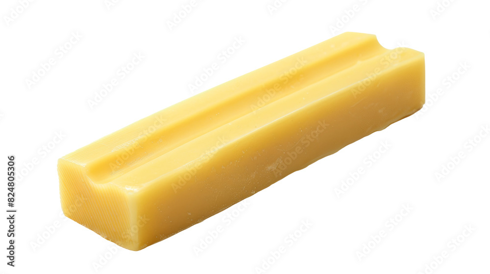 A yellow bar of soap placed on a plain white background A yellow bar of soap placed on a plain white background