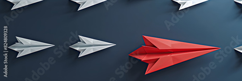 Emerging leader concept. White paper origami airplanes led by red airplane. navy blue background.  