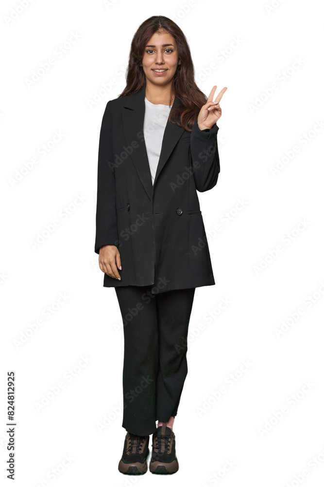 Middle Eastern in business attire showing victory sign and smiling broadly. Middle Eastern in business attire showing victory sign and smiling broadly.
