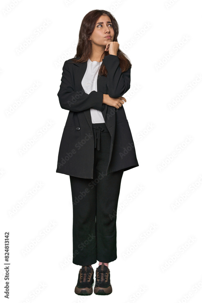 Middle Eastern in business attire thinking and looking up, being reflective, contemplating, having a fantasy. Middle Eastern in business attire thinking and looking up, being reflective, contemplating, having a fantasy.