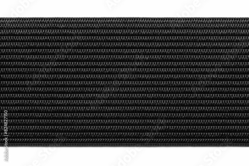 The elastic band is wide for household use. Background, black texture, close-up.