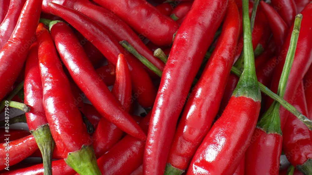 Explore the mesmerizing world of red chili peppers in macro. Witness the delicate textures, vibrant hues, and intricate patterns that make these peppers a botanical marvel. 
