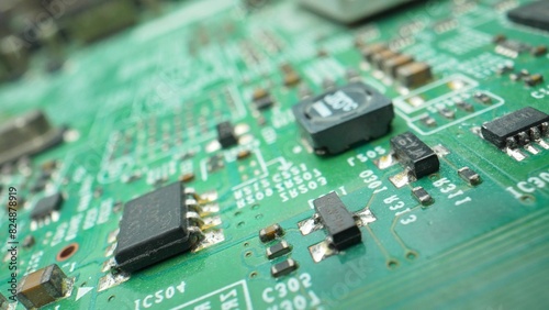 Think of a Printed Circuit Board (PCB) like a puzzle board for gadgets. It has copper pathways that connect the tiny electronic parts together, making our devices work smoothly. Electronic concept. 