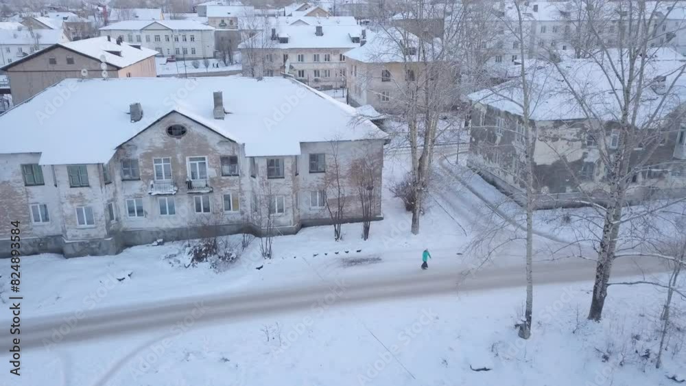 Russia. Snowcovered city landscape with frozen buildings,and roads from above Russia. Snowcovered city landscape with frozen buildings,and roads from above