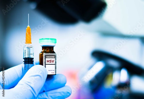 Vaccine bottles and syringes for preventing  herpes simplex virus (HSV). photo