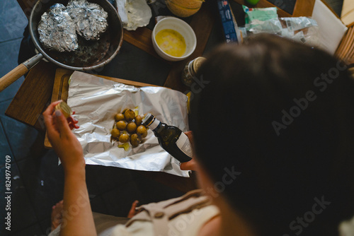 High angle view of woman preparing food at party photo