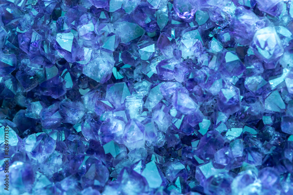 Blue Crystal Mineral Stone. Gems. Mineral crystals in the natural environment. Texture of precious and semiprecious stones. Seamless background with copy space colored shiny surface of precious stones Blue Crystal Mineral Stone. Gems. Mineral crystals in the natural environment. Texture of precious and semiprecious stones. Seamless background with copy space colored shiny surface of precious stones