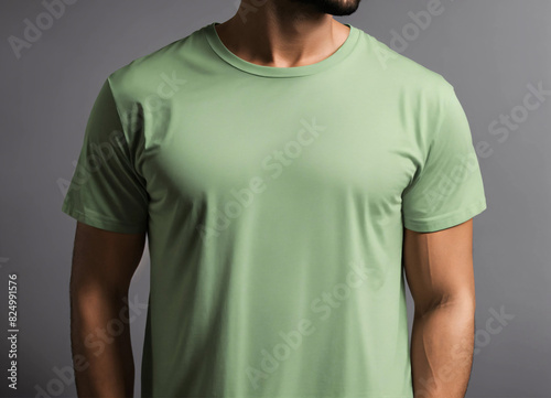 man in stylish light green t-shirt on gray background, front view. Mockup for design, mock up, template