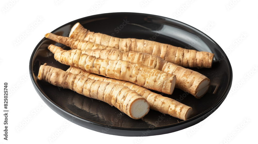A black plate is shown with sliced up carrots arranged neatly on top, ready to be served or cooked A black plate is shown with sliced up carrots arranged neatly on top, ready to be served or cooked