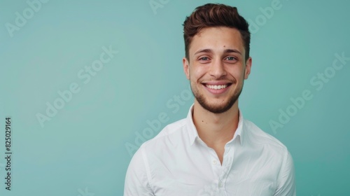 a handsome, smiling business guy wearing a shirt, feeling confident, isolated on a light blue background