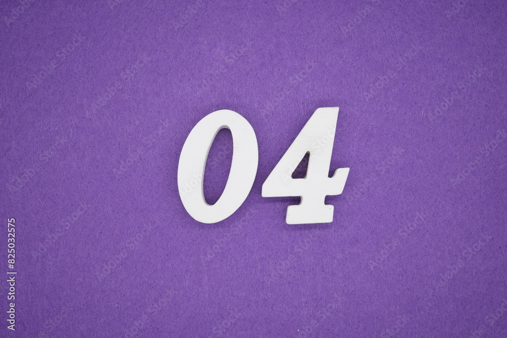 The numbers are made of white paint wood, placed on the background as a purple paper. The numbers are made of white paint wood, placed on the background as a purple paper.