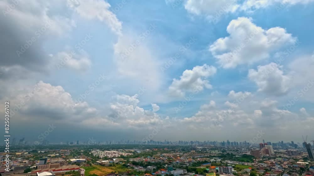 Blue sky white clouds above the city urban skyscrapers by the river. Puffy fluffy white clouds. Cumulus cloud cloudscape timelapse. Summer blue sky time lapse loop Blue sky white clouds above the city urban skyscrapers by the river. Puffy fluffy white clouds. Cumulus cloud cloudscape timelapse. Summer blue sky time lapse loop