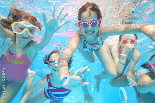 kids swimming in pool