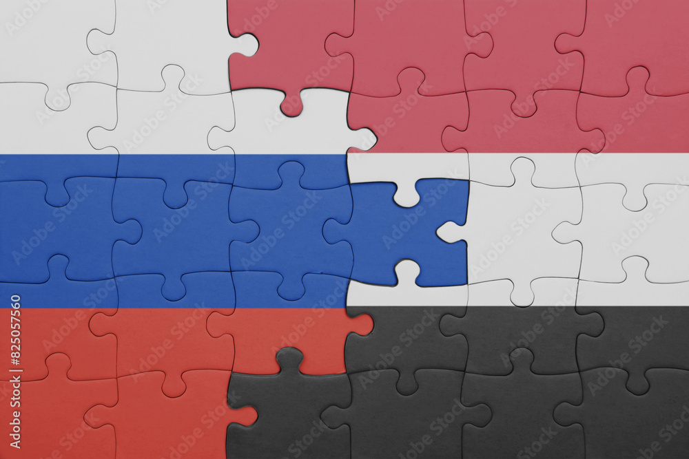 puzzle with the colourful national flag of yemen and flag of russia. puzzle with the colourful national flag of yemen and flag of russia.