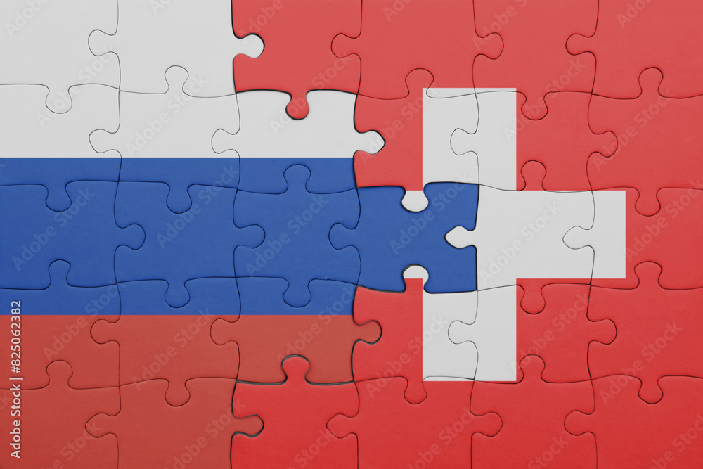 puzzle with the colourful national flag of switzerland and flag of russia. puzzle with the colourful national flag of switzerland and flag of russia.