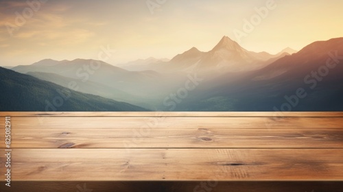 A wooden table surface with a moutain and blurred backdrop Empty wooden table background  product display montage Background with empty bokeh wooden table.For designers and advertising banner