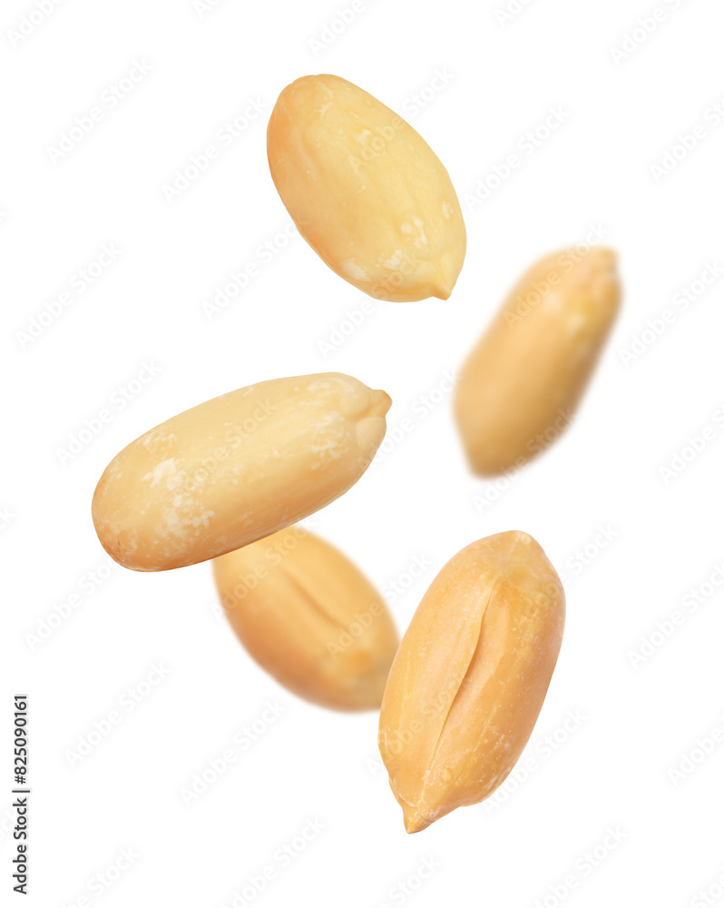 Many peanuts in air on white background Many peanuts in air on white background