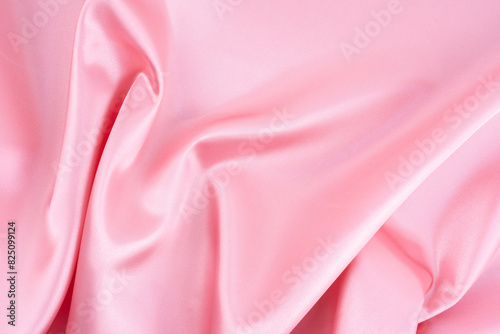 Pink silk fabric texture as background