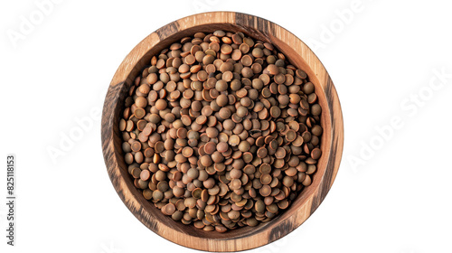 A wooden bowl brimming with lentils sits on a pristine white surface, showcasing the earthy grains against a minimalist backdrop