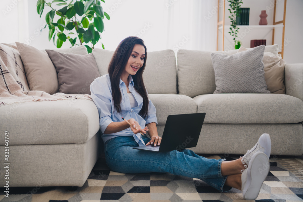 Full size photo of nice lady chatting video call laptop wear blue shirt bright interior flat indoors Full size photo of nice lady chatting video call laptop wear blue shirt bright interior flat indoors