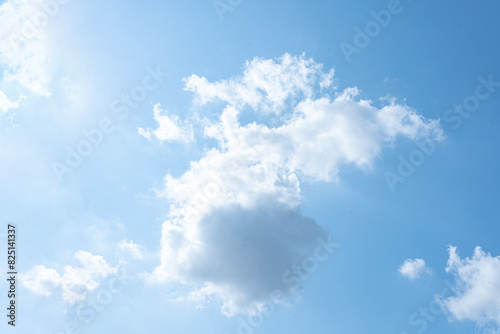 Blue Sky with Fluffy Clouds on a Sunny Summer Day
