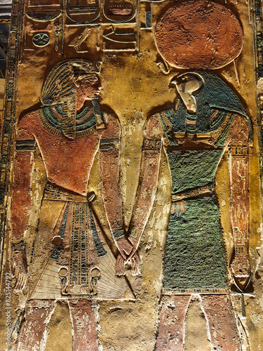 Bilde på lerret Painted wall relief in Burial chamber J showing Pharoah Seti I before God Ra Hor